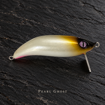 PhD Frog Fish WAKE lure in Pearl Ghost on black slate