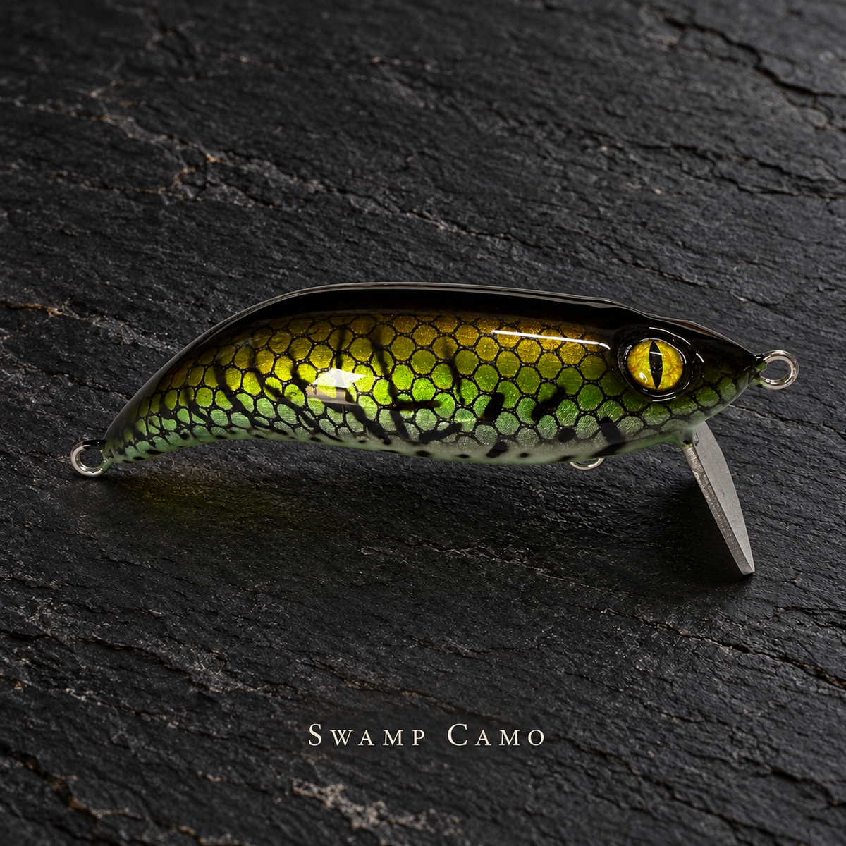 PhD Frog Fish WAKE lure in Swamp Camo on black slate