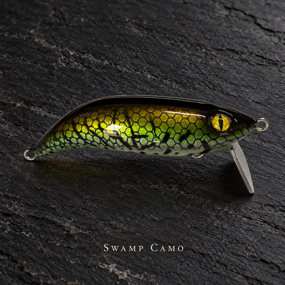 PhD Frog Fish WAKE lure in Swamp Camo on black slate